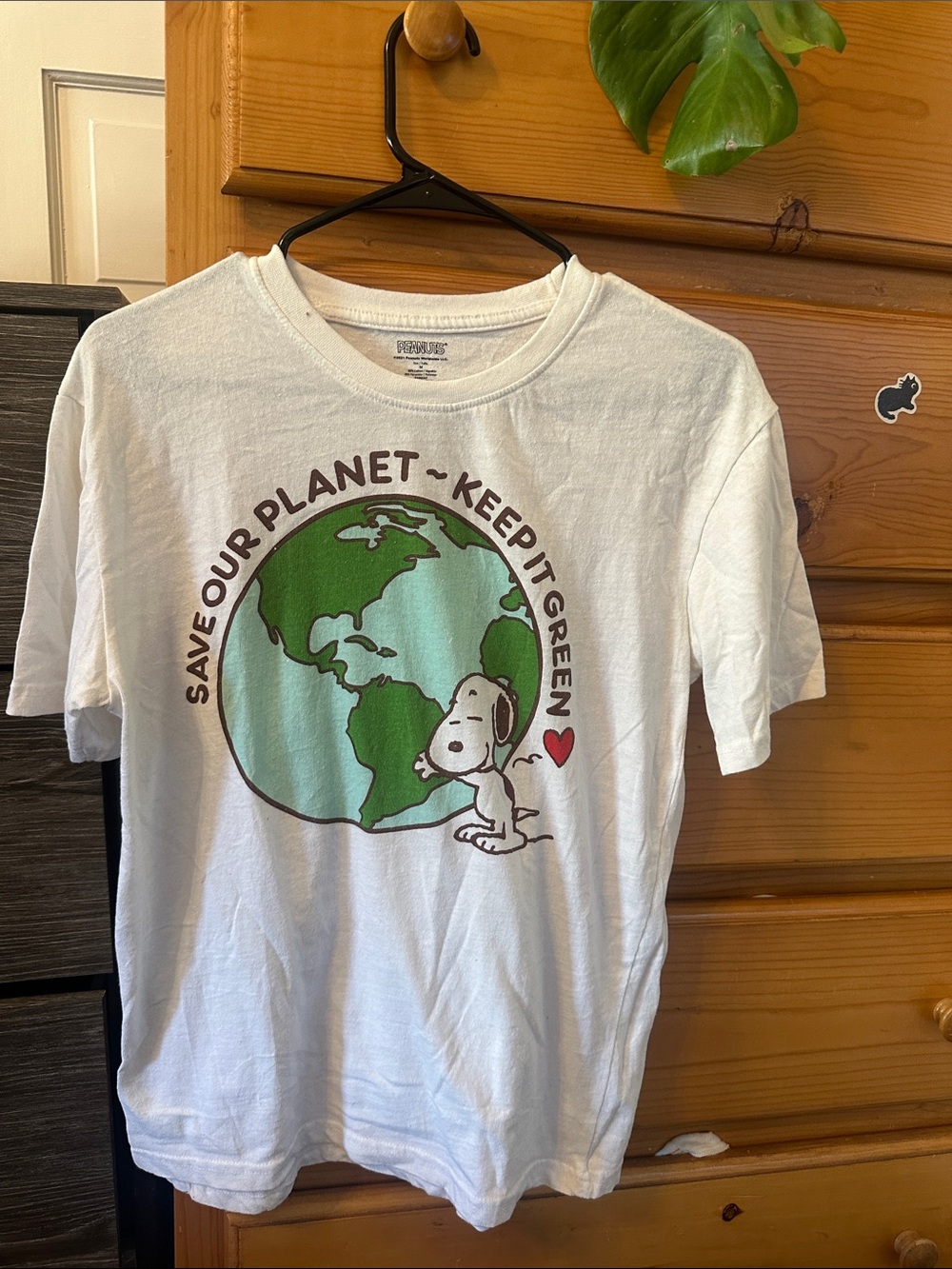 Peanuts White Tee with Green Earth & Snoopy Graphic